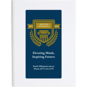 A white sticky note pad featuring a blue and gold emblem, with a logo and text on the cover.