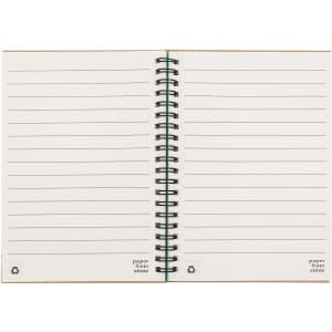 A Stone Paper Notebook featuring blank lined pages and a spiral binding.