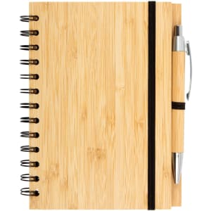 A bamboo notebook featuring a spiral binding and an elastic band, accompanied by a silver and bamboo pen.