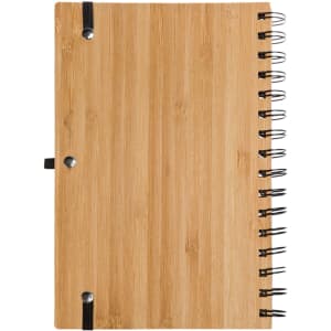 A bamboo-covered spiral A5 notebook with a metal spiral binding and elastic closure.