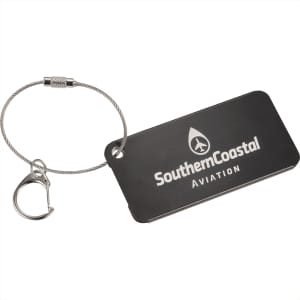 A black aluminium identification tag with a metal loop for attachment and a logo.
