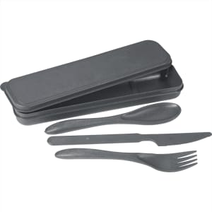 A bamboo fibre cutlery set in black, including a spoon, knife, fork, and carrying case.
