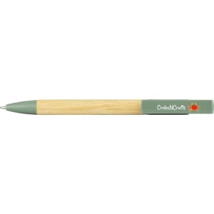 A bamboo pen with a green top and clip, featuring a logo.