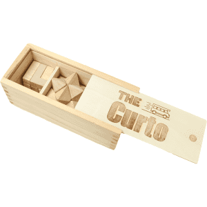 A wooden puzzle set featuring various geometric shapes in a light wood box with a hinged lid and engraved design.