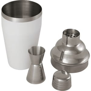 A stainless steel cocktail shaker set featuring a white shaker, jigger, strainer, and lid. Includes a logo.