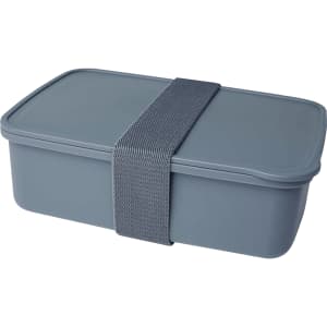 A grey lunch box with a tight-fitting lid secured by a grey strap, featuring a simple design and a logo.