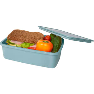 A light blue lunch box containing a sandwich, cucumber, cherry tomatoes, and a bell pepper. It has a lid and a logo.