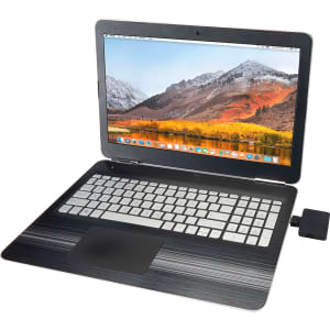 A laptop with a striped design, displaying a mountain scenery, and connected to a device on the side.