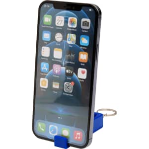A blue recycled plastic phone stand with a fidget toy, holding a smartphone displaying various apps.