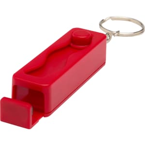 A red recycled plastic phone stand with a fidget toy attachment, featuring a keychain for easy carrying.