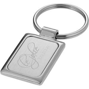A rectangular silver keyring featuring a polished metal surface and a circular attachment loop.