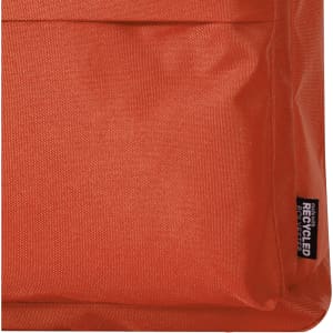 An orange backpack featuring a textured fabric and a tag indicating recycled materials.