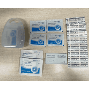 A portable first aid kit featuring cleansing wipes, non-woven sponges, alcohol pads, and a plastic case.