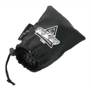 A black drawstring pouch containing two massage balls, featuring a logo on the front.