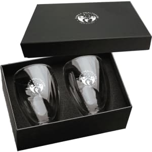A glass coffee and tea set featuring two clear glasses in a black gift box, with a logo on each glass.