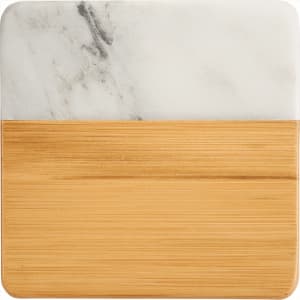A marble and bamboo coaster featuring a white marble top and a natural bamboo bottom. It has a simple, elegant design.