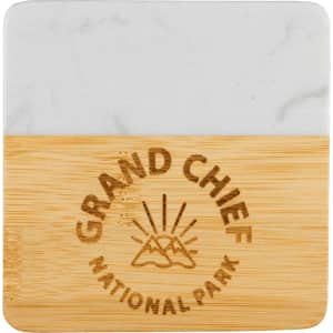 A marble and bamboo coaster featuring a logo, with a white marble top and a natural bamboo base.