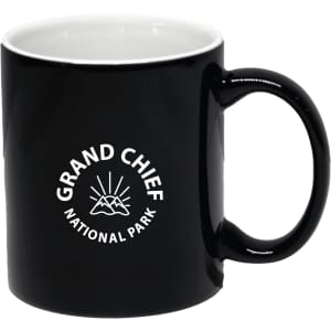 A black coffee mug with a logo featuring mountains and sunburst design. Holds 300ml.
