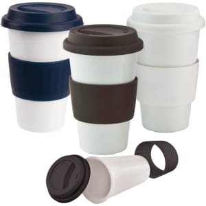 A ceramic coffee mug set featuring white and dark-coloured mugs with silicone sleeves and lids for heat protection.
