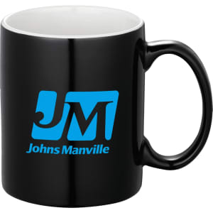A ceramic coffee mug in black, featuring a blue logo on one side. Packaged in a folded box.