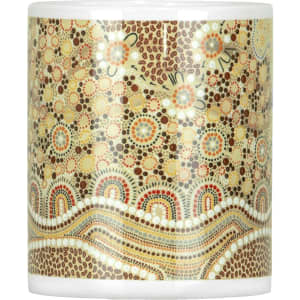 A ceramic mug featuring a decorative pattern in earthy tones of brown, orange, and cream. It comes in a box.