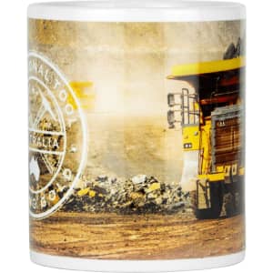 A ceramic coffee mug featuring a heavy machinery design, primarily in yellow and white, with a logo.
