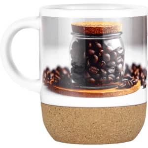 A coffee mug featuring a glossy white upper section and a cork base, decorated with coffee beans and a jar design.