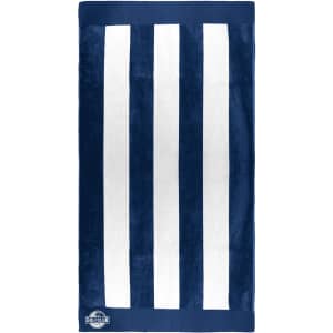 A navy blue and white striped beach towel featuring a logo at the bottom. Soft texture suitable for leisure use.