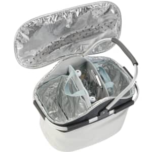 A cooler bag in white and silver, featuring a removable divider and a metallic interior lining. It has a handle and a zipper closure.