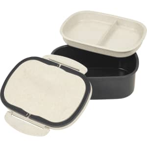 A plastic and wheat straw lunch box in cream and black, featuring two compartments and a lid. It includes a logo.