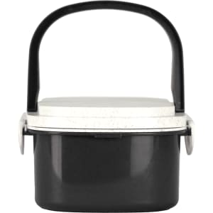 A plastic and wheat straw lunch box in black with a white lid and a black handle. Features a logo.