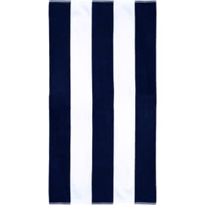 A striped cotton beach towel featuring navy blue and white colours with a logo in one corner.