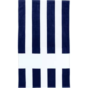 A striped beach towel featuring navy blue and white colours, with a branded logo on it.