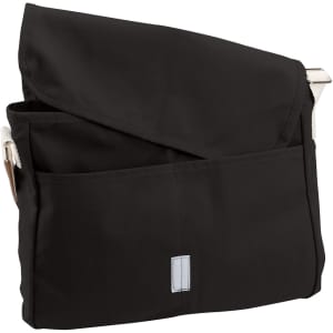A black canvas shoulder bag with a flap and exterior pocket, featuring a shoulder strap and a logo.