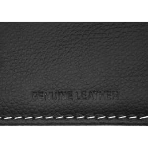 A close-up of a black leather texture featuring embossed text "Genuine Leather" and white stitching.