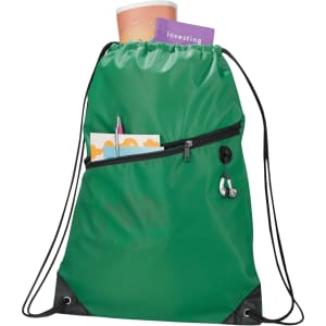 A green drawstring bag with a zip pocket, holding a drink bottle, pen, and small cards. It has a logo.