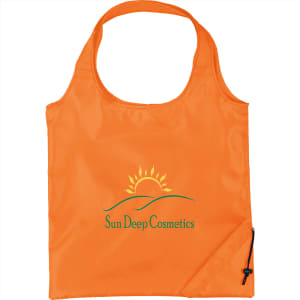 An orange foldaway shopper tote bag with a logo printed on the front.