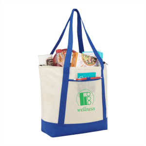 A non-woven tote cooler in cream and blue, with various food items inside and featuring a logo.