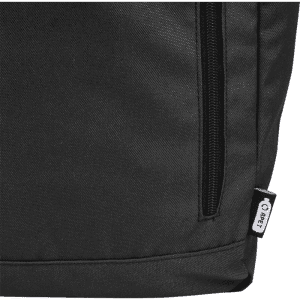 A black roll-top backpack with a zip pocket and a small label on the side.