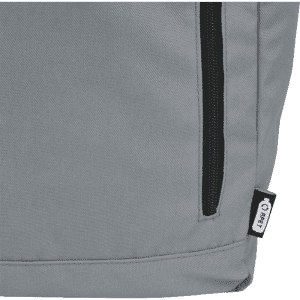 A grey roll-top backpack featuring a zippered pocket and a small brand logo.