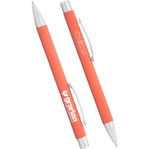 A set of coral-coloured metal ballpoint pens with silver accents and a logo.