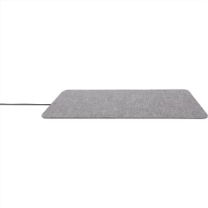 A grey ultra-thin fabric wireless charging pad with a sleek design and a connecting cable.