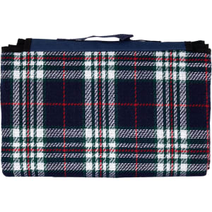 A folded picnic rug with a navy, green, and red tartan pattern, featuring a handle for carrying.