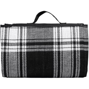 A folded picnic rug featuring a black and white check pattern, with a carrying handle on top.