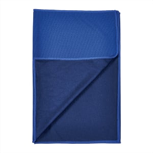 A blue cooling towel with a textured surface on one side and a smooth surface on the other, featuring a logo.