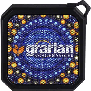 A square Bluetooth speaker with a vibrant circular pattern in blues, yellows, and oranges, featuring a logo.