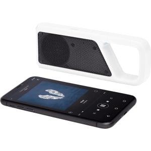 A white Bluetooth speaker with a handle next to a black smartphone displaying music playback. The speaker features a mesh grill.