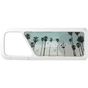 A white Bluetooth speaker featuring a palm tree design on the front and a handle for portability.