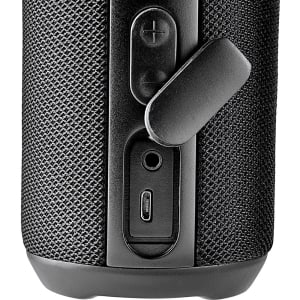 A rugged black waterproof Bluetooth speaker with control buttons and a USB-C port on the side.