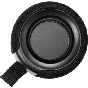 A round, black Breakaway Bluetooth speaker with a textured fabric surface and a strap for easy carrying.